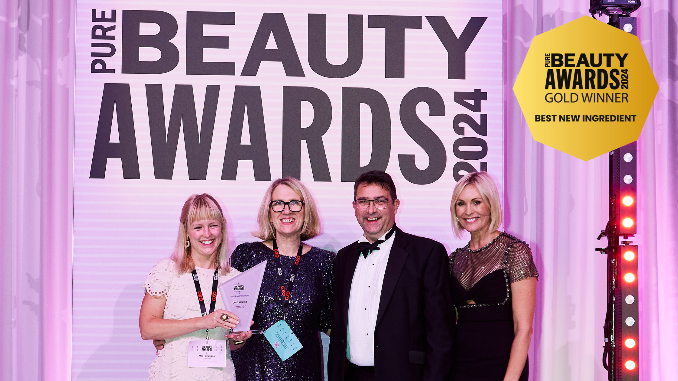 people receiving award at ceremony